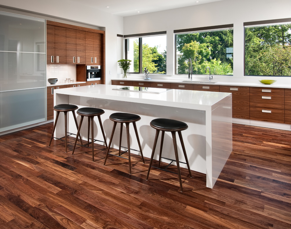 Inspiration for a contemporary kitchen in Ottawa with an undermount sink, flat-panel cabinets and medium wood cabinets.