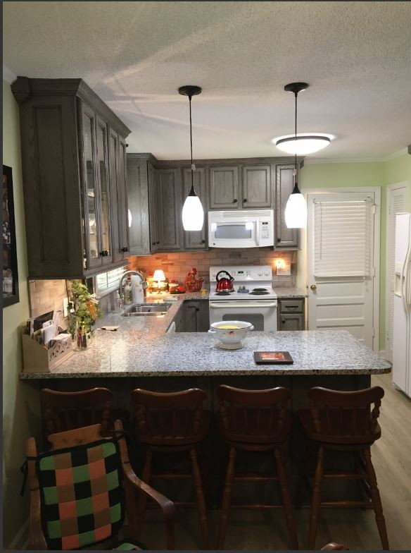 Mountain style home design photo in Raleigh