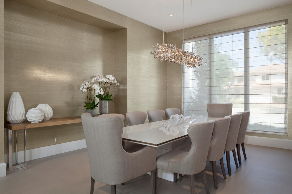 Design ideas for a large contemporary separate dining room in Miami with beige walls, porcelain floors and no fireplace.