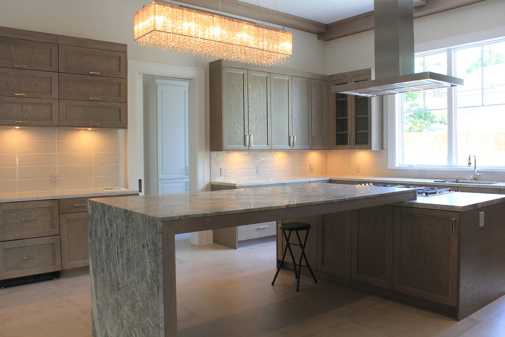 Example of a transitional kitchen design in Houston