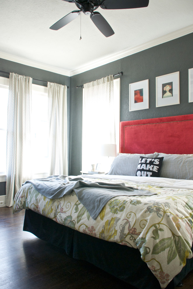 Transitional bedroom in Dallas with grey walls.