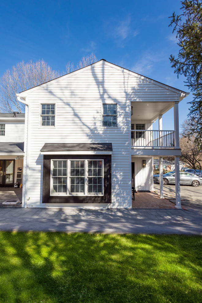 Example of a huge transitional home design design in Baltimore