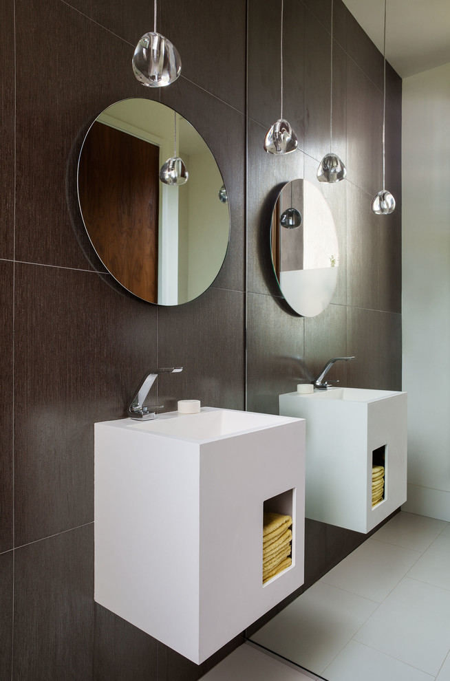 Design ideas for a contemporary bathroom in San Francisco with flat-panel cabinets, white cabinets, brown tile and white walls.