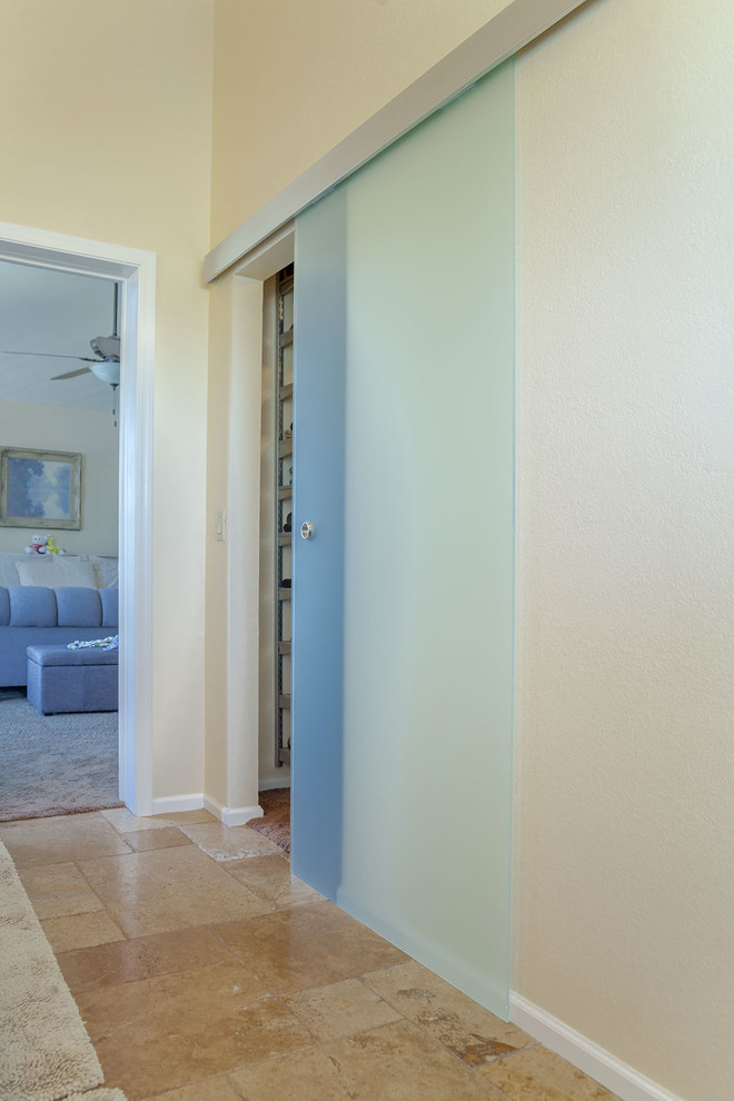 Large transitional master brown tile and porcelain tile ceramic tile walk-in shower photo in Phoenix with recessed-panel cabinets, dark wood cabinets, a two-piece toilet, beige walls, an undermount sink and granite countertops