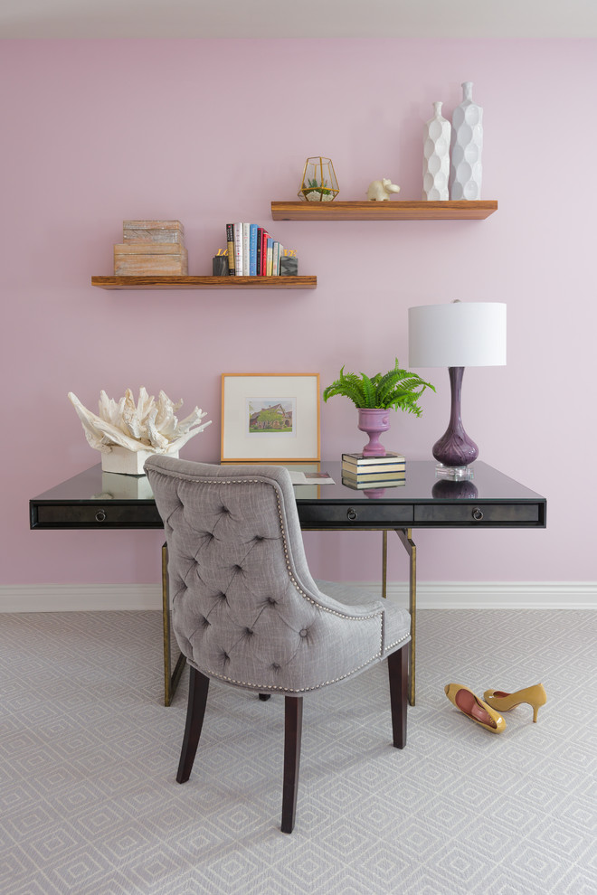 Inspiration for a transitional home office in St Louis with carpet, a freestanding desk, grey floor and pink walls.
