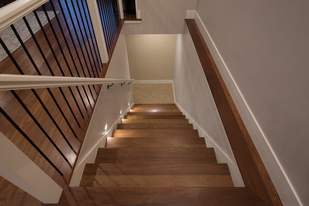 This is an example of a mid-sized traditional staircase in Seattle.