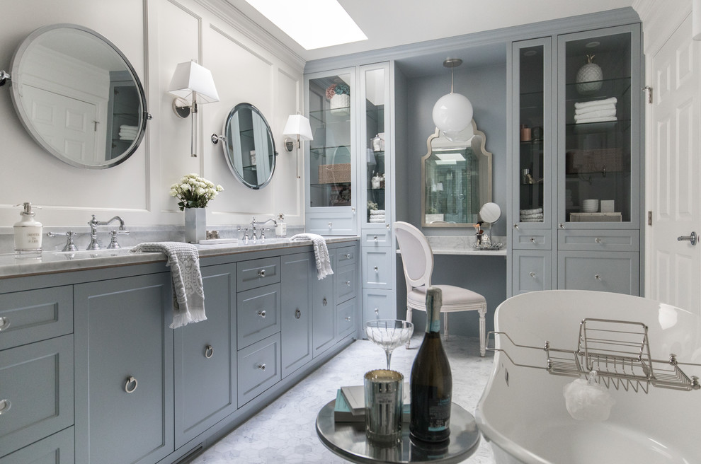 Inspiration for a transitional gray floor bathroom remodel in Calgary with white walls
