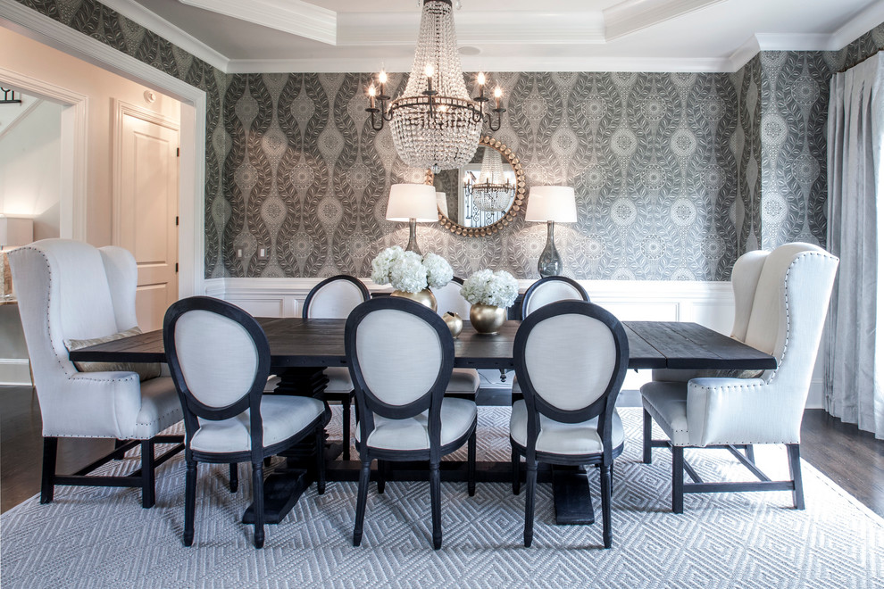 Inspiration for a traditional separate dining room in Charlotte with grey walls and dark hardwood floors.