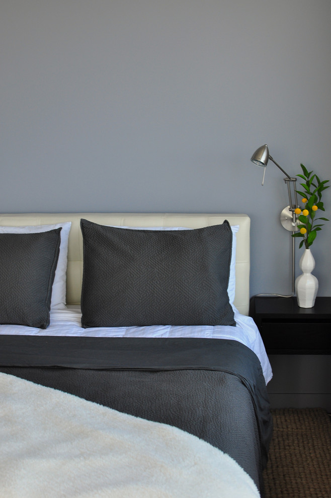 Inspiration for a contemporary bedroom in Austin with grey walls.