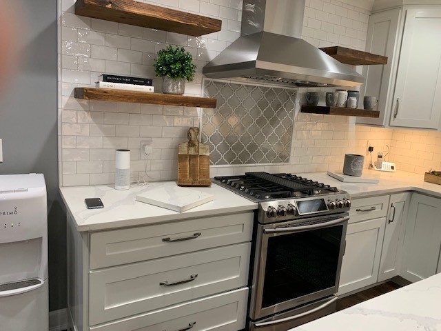 Example of a transitional kitchen design in New York