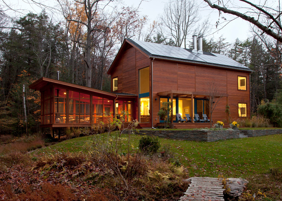 Trendy wood exterior home photo in New York