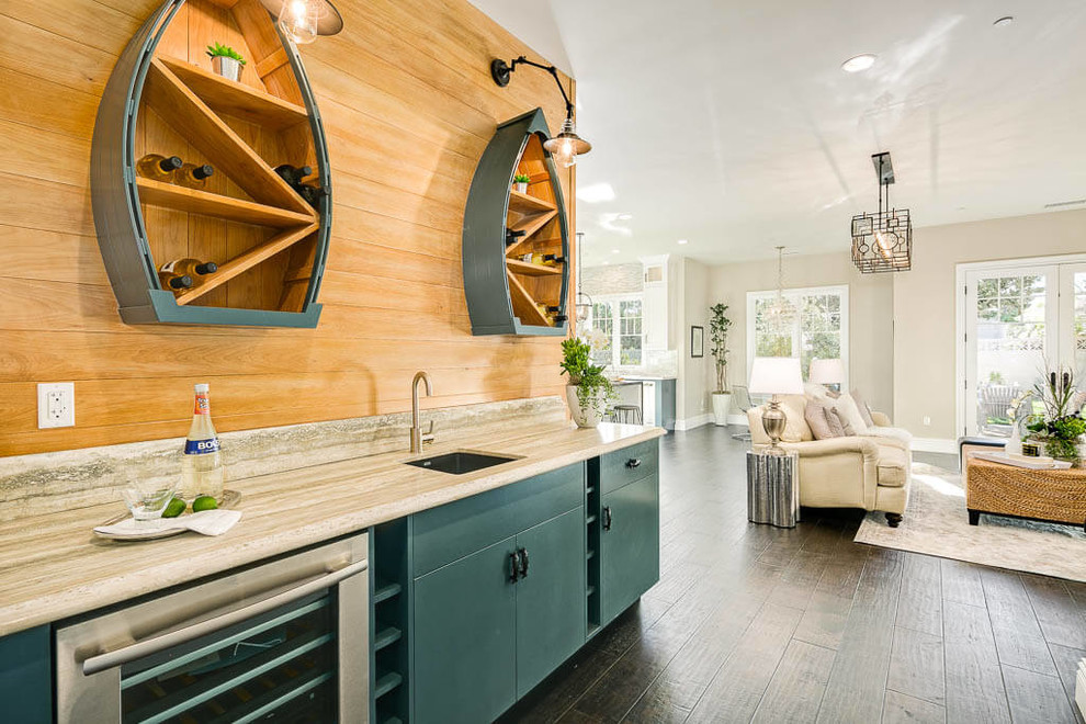 Beach style single-wall wet bar in Los Angeles with an undermount sink, flat-panel cabinets, blue cabinets, brown splashback, dark hardwood floors and brown floor.