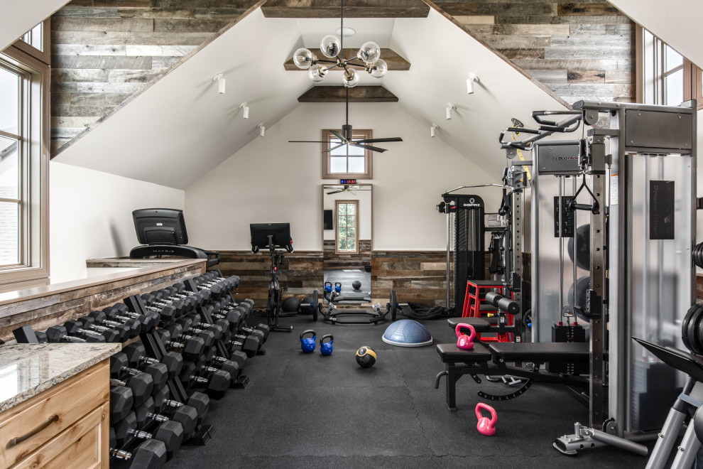 Photo of a large contemporary multipurpose gym in Nashville with beige walls, black floor and vaulted.