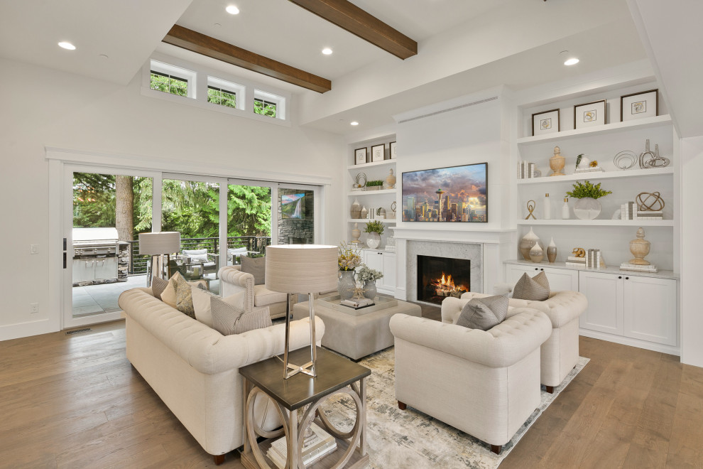 Inspiration for a large arts and crafts open concept family room in Seattle with white walls, medium hardwood floors, a standard fireplace, a tile fireplace surround, a wall-mounted tv, brown floor and exposed beam.