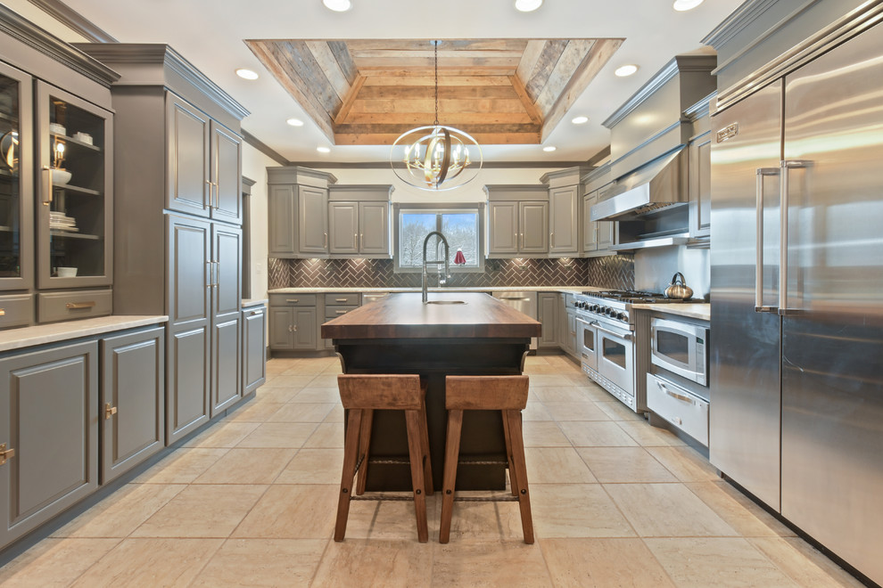 Eat-in kitchen - mid-sized transitional u-shaped ceramic tile and beige floor eat-in kitchen idea in Chicago with an undermount sink, raised-panel cabinets, gray cabinets, granite countertops, black backsplash, ceramic backsplash, stainless steel appliances and an island
