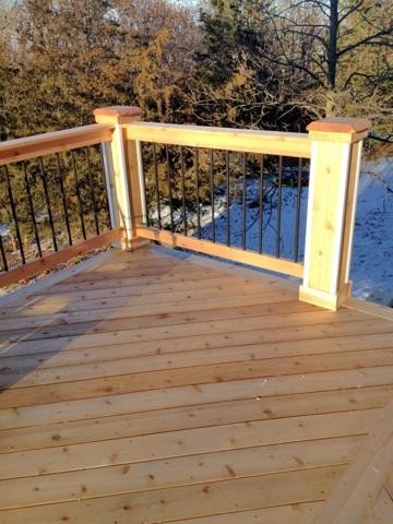 This is an example of a large contemporary backyard deck in Other with no cover.