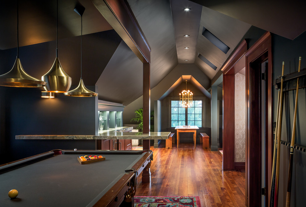 Traditional family room in San Francisco with a game room, grey walls, dark hardwood floors and brown floor.