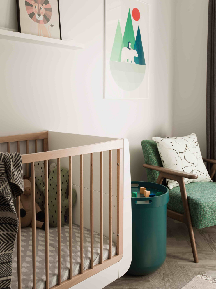 エセックスにあるラグジュアリーな小さな北欧スタイルのおしゃれな赤ちゃん部屋の写真