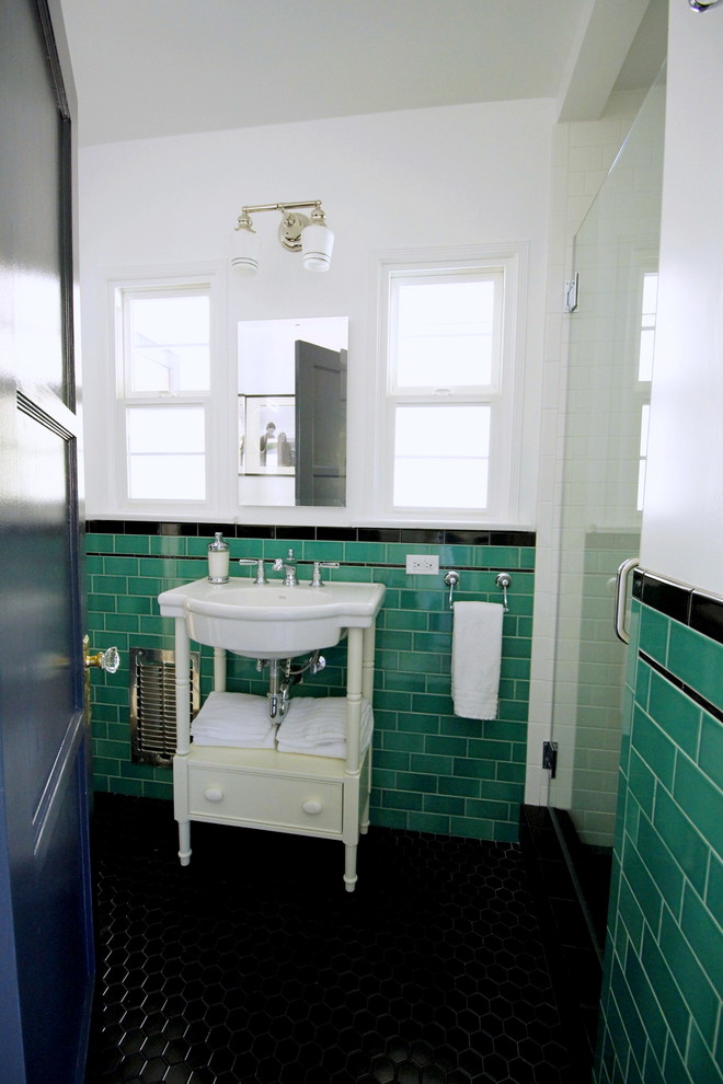 Photo of a small traditional 3/4 bathroom in Los Angeles with white cabinets, an alcove shower, a two-piece toilet, green tile, subway tile, white walls, open cabinets, mosaic tile floors and a console sink.