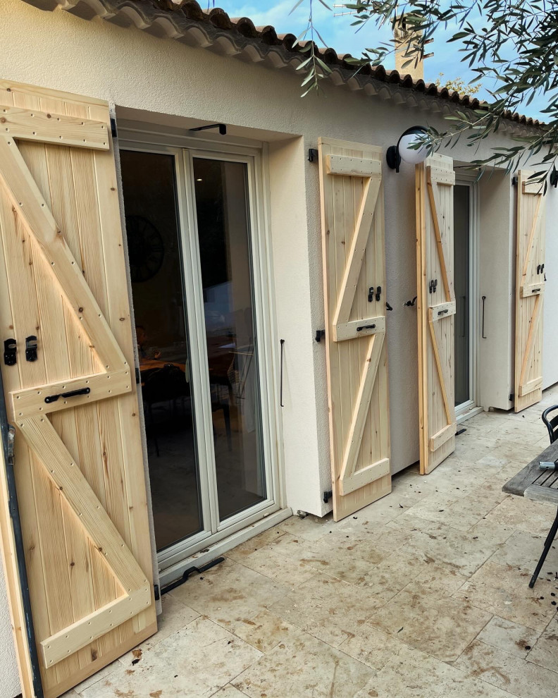 Fabrication et pose de volets à écharpes