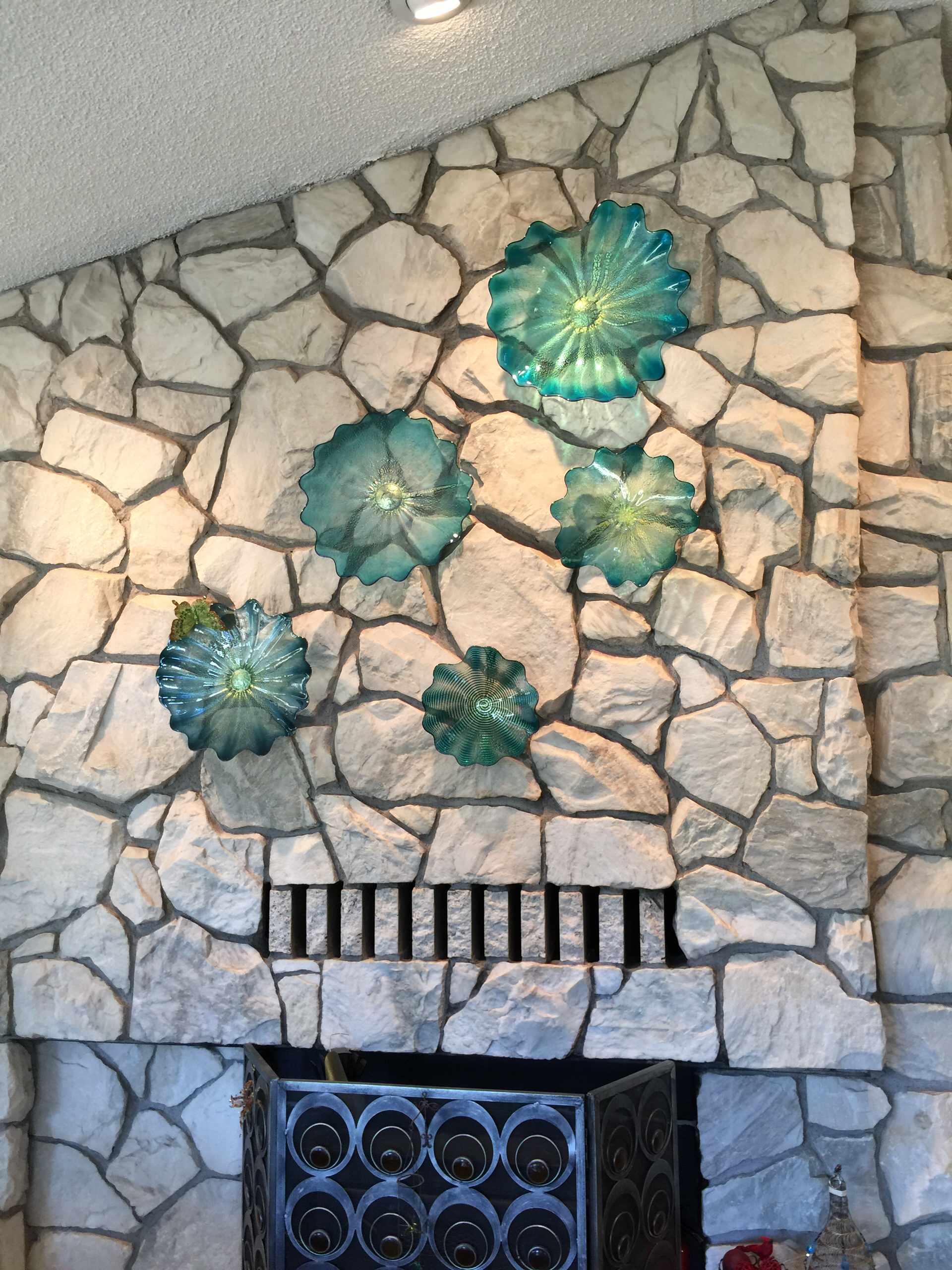 Hand blown Art Glass installed on Fireplace