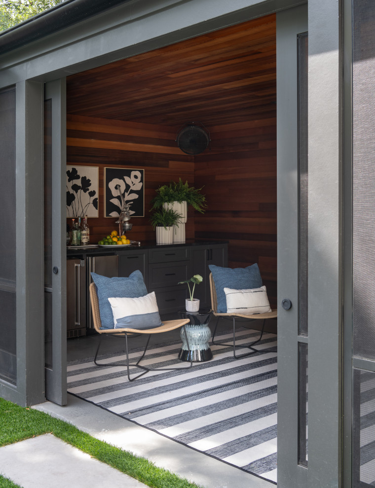Example of a small transitional home design design in Austin
