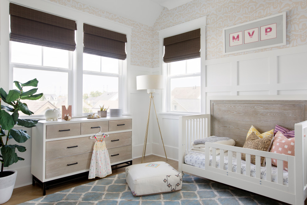 Example of a beach style nursery design in Charleston