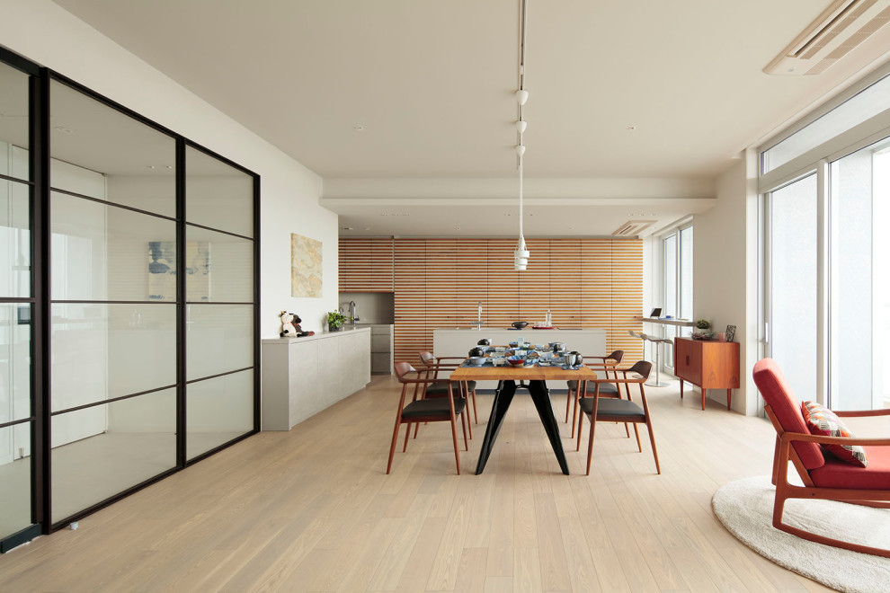Inspiration for a large modern light wood floor, beige floor, wallpaper ceiling and shiplap wall great room remodel in Tokyo with white walls