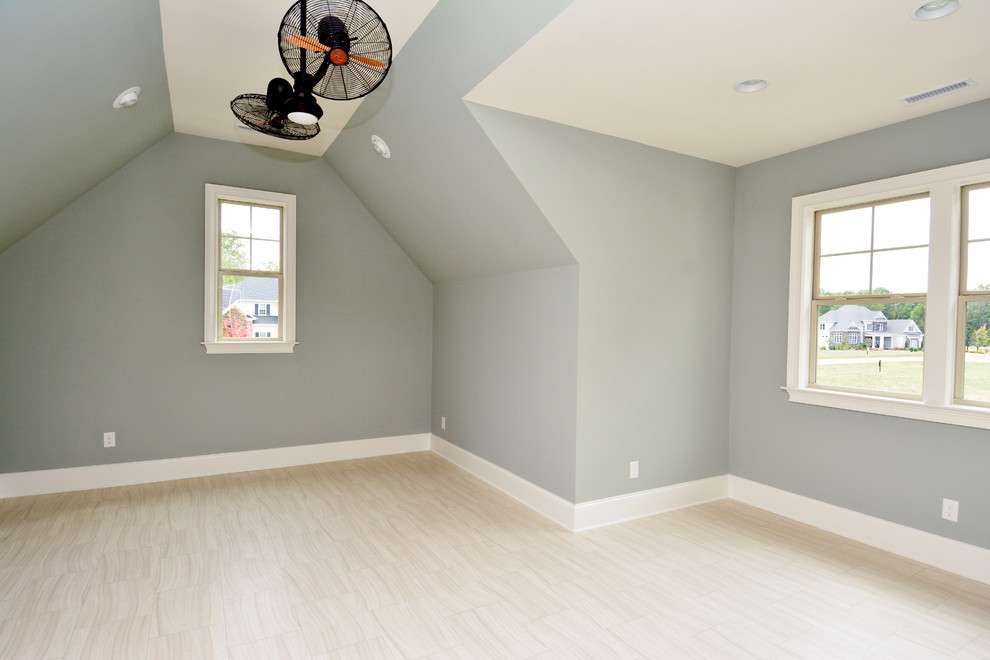 Photo of a transitional home design in Raleigh.
