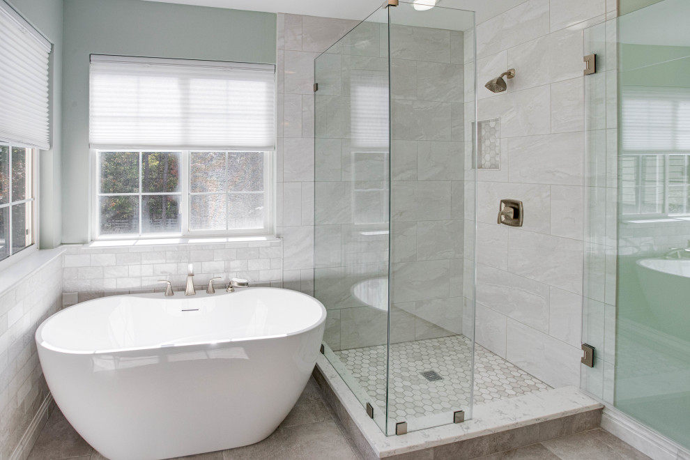 Inspiration for a large classic ensuite bathroom in DC Metro with recessed-panel cabinets, white cabinets, a freestanding bath, a corner shower, marble tiles, green walls, ceramic flooring, a built-in sink, engineered stone worktops, a hinged door, a wall niche, double sinks and a built in vanity unit.