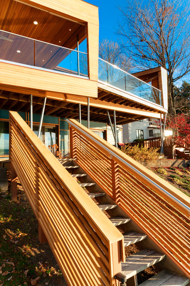 Inspiration for a modern exterior in New York with wood siding.
