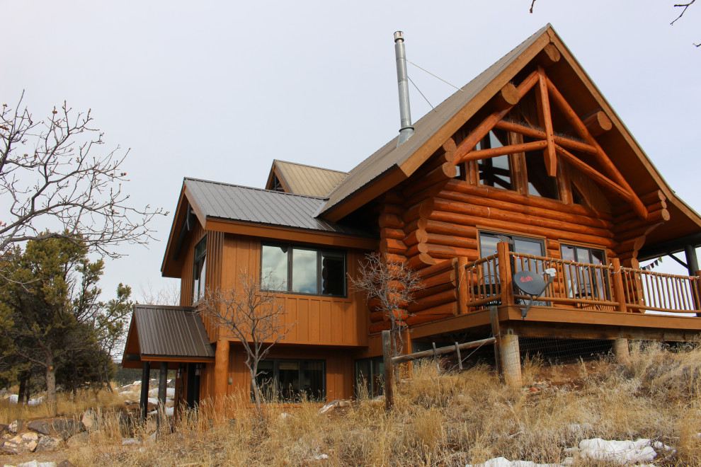 Inspiration for a rustic home design remodel in Denver