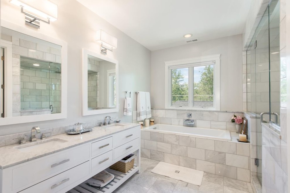 Design ideas for a large traditional master bathroom in Cedar Rapids with flat-panel cabinets, white cabinets, an alcove tub, an alcove shower, a two-piece toilet, gray tile, stone tile, grey walls, marble floors, an undermount sink, marble benchtops, multi-coloured floor and a hinged shower door.