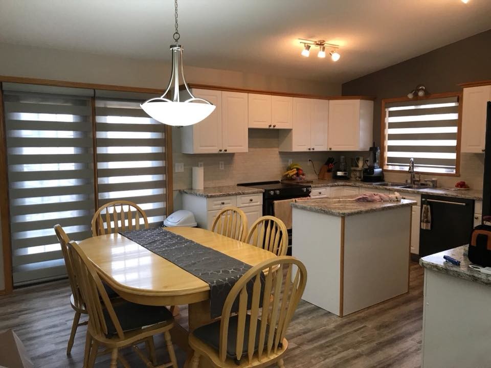 Transitional home design photo in Calgary