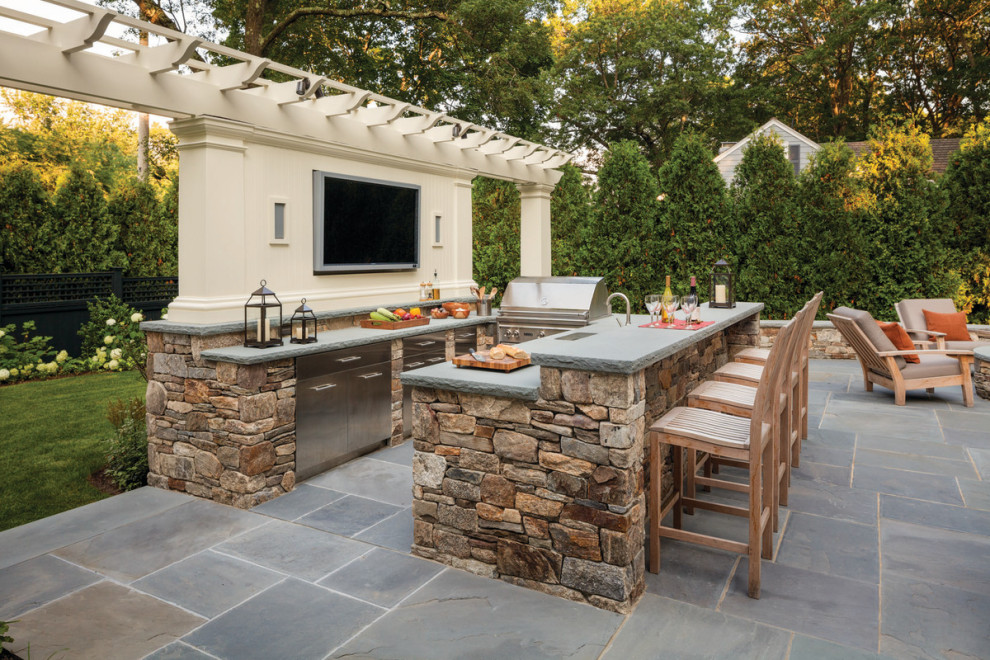 Inspiration for a mid-sized patio in New York with brick pavers.