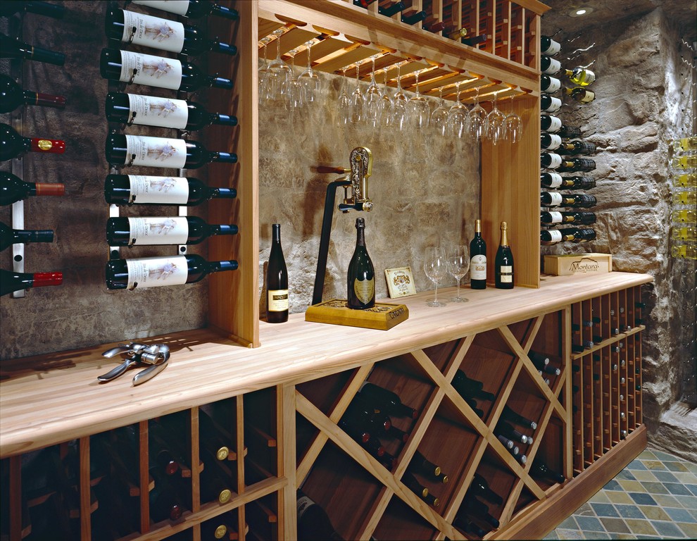 Wine cellar - mid-sized transitional porcelain tile and black floor wine cellar idea in Phoenix with display racks