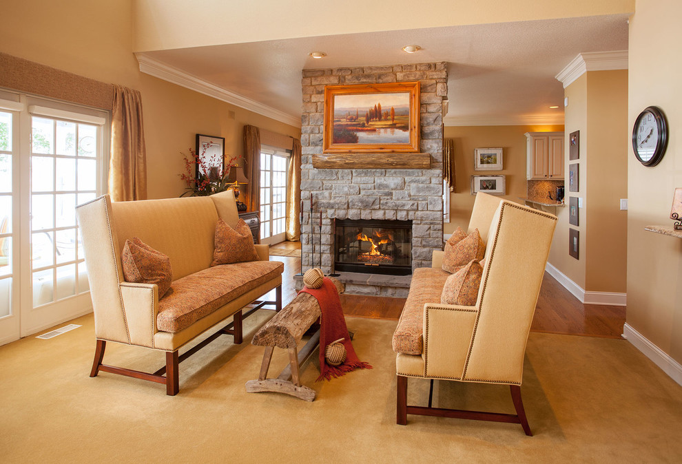 Mid-sized country formal open concept living room in Detroit with brown walls, carpet, a two-sided fireplace, a stone fireplace surround, no tv and beige floor.