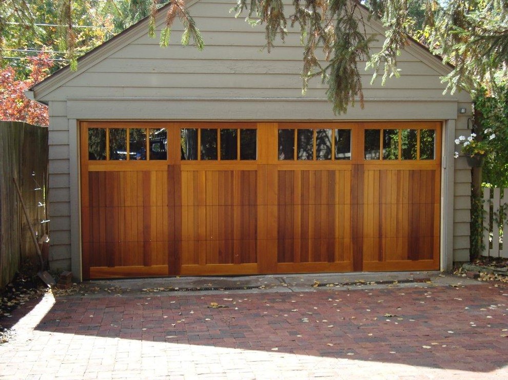 Photo of a mid-sized traditional detached two-car garage in Cleveland.