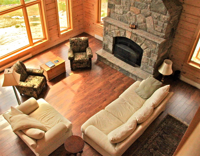 Island Log Cottage rustic-living-room