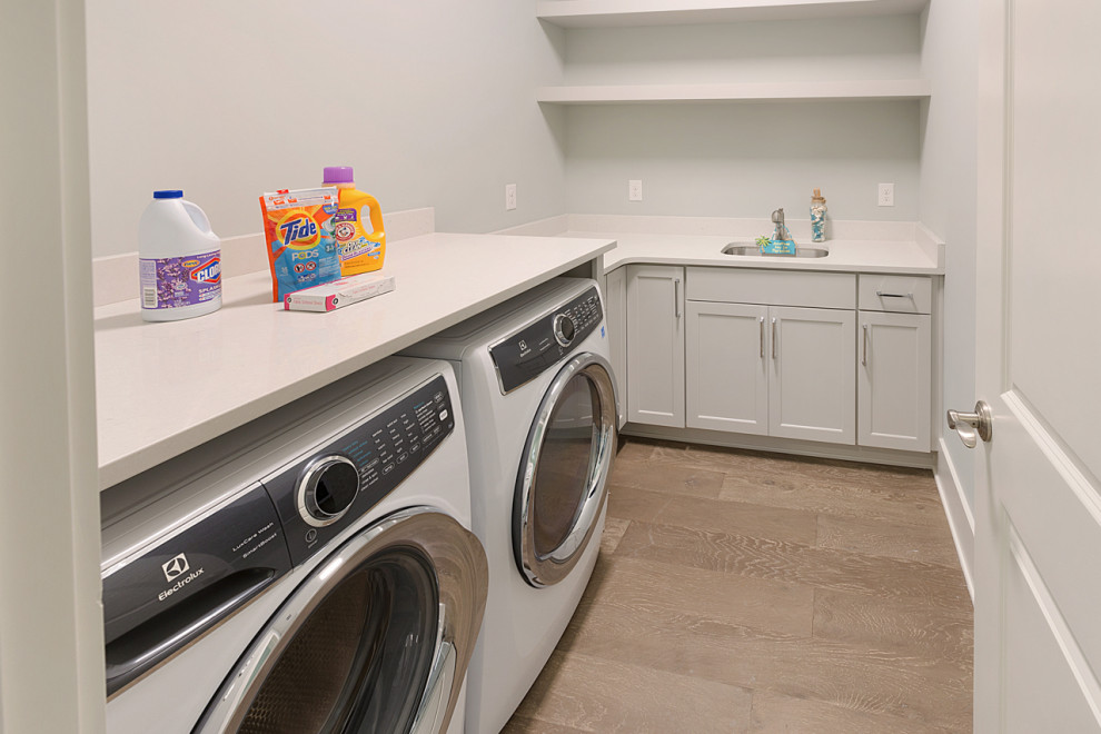 Photo of a beach style laundry room in Jacksonville.