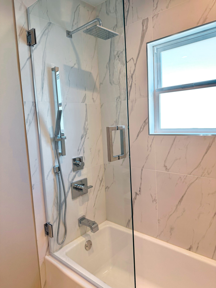 Photo of a mid-sized modern 3/4 bathroom in Los Angeles with flat-panel cabinets, brown cabinets, an alcove tub, a shower/bathtub combo, white tile, porcelain tile, white walls, porcelain floors, an undermount sink, engineered quartz benchtops, white floor, a hinged shower door, white benchtops, a shower seat, a single vanity and a floating vanity.