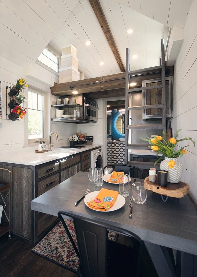 Open concept kitchen - small transitional single-wall dark wood floor open concept kitchen idea in Oklahoma City with an undermount sink, flat-panel cabinets, medium tone wood cabinets and no island