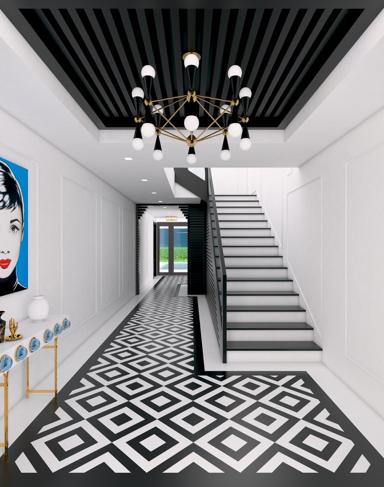 Example of a large eclectic marble floor and white floor foyer design in Miami with white walls and a black front door