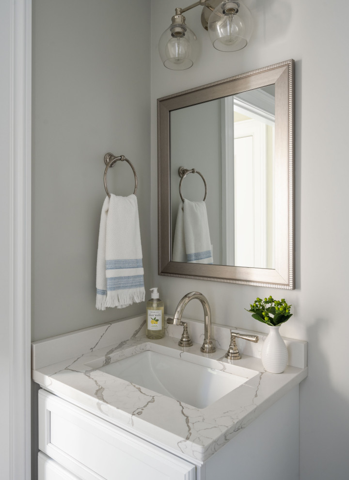 Design ideas for a traditional bathroom in Boston with white cabinets, gray tile, white walls, ceramic floors, an undermount sink, engineered quartz benchtops, grey floor, white benchtops, a single vanity and a built-in vanity.