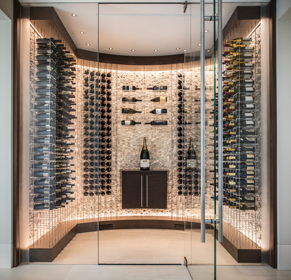 This is an example of a small contemporary wine cellar in San Francisco with display racks.