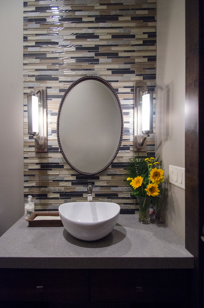 Photo of a contemporary powder room in Salt Lake City with dark wood cabinets, beige tile, blue tile, gray tile, beige walls, concrete benchtops and glass tile.