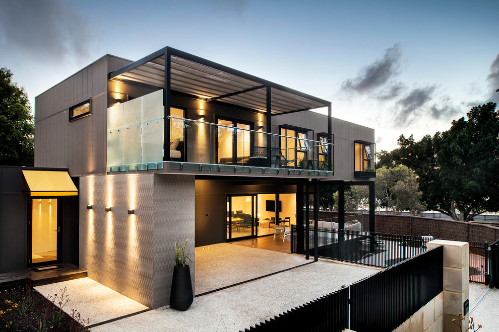 This is an example of a mid-sized contemporary two-storey brown exterior in Perth with concrete fiberboard siding.