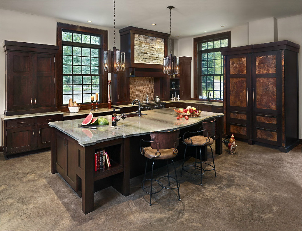 Contemporary kitchen in Denver with shaker cabinets, dark wood cabinets and panelled appliances.