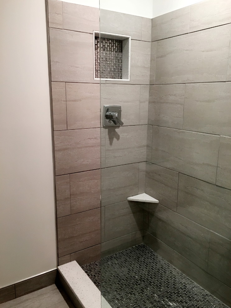 Mid-sized transitional beige tile, brown tile and porcelain tile porcelain tile and beige floor alcove shower photo in Detroit with a two-piece toilet and beige walls