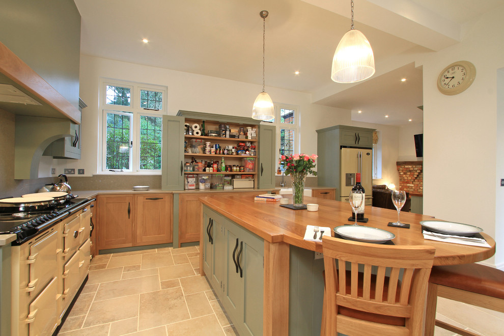 Inspiration for a transitional l-shaped eat-in kitchen in Hampshire with a double-bowl sink, shaker cabinets, light wood cabinets, quartz benchtops, stone slab splashback and coloured appliances.